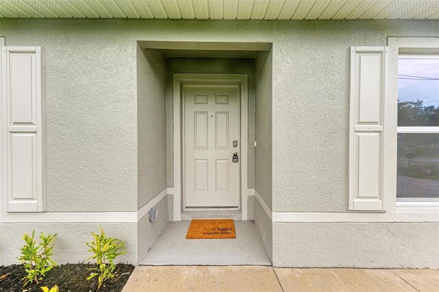 3879 E Price Blvd, North Port, FL 34288 - property entrance with stucco siding