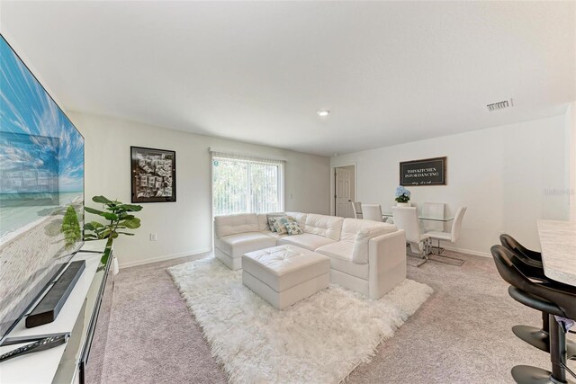 3879 E Price Blvd, North Port, FL 34288 - living area with baseboards, visible vents, and carpet floors