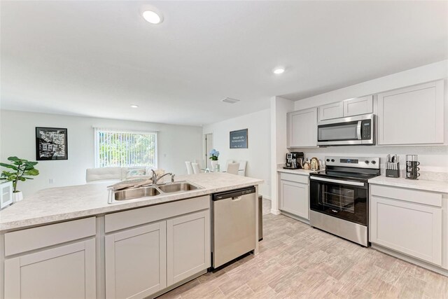 3879 E Price Blvd, North Port, FL 34288 - kitchen featuring visible vents, recessed lighting, light countertops, a sink, and stainless steel appliances