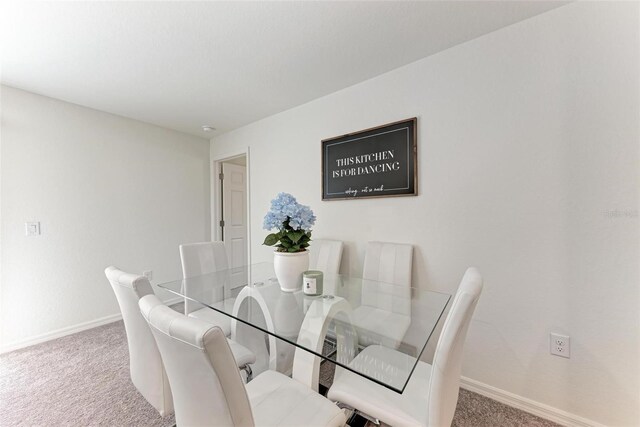 3879 E Price Blvd, North Port, FL 34288 - carpeted dining room featuring baseboards