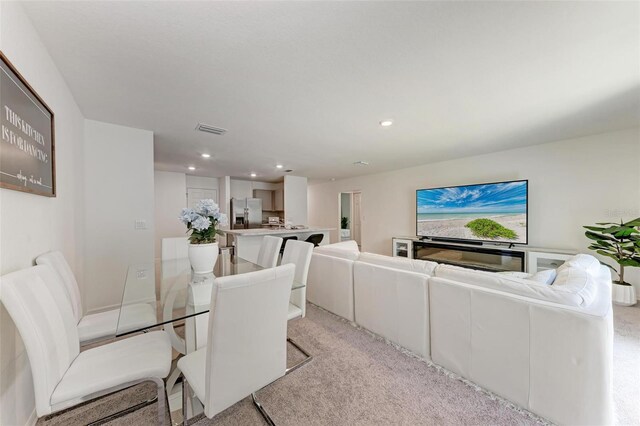 3879 E Price Blvd, North Port, FL 34288 - dining area featuring visible vents, recessed lighting, and light carpet