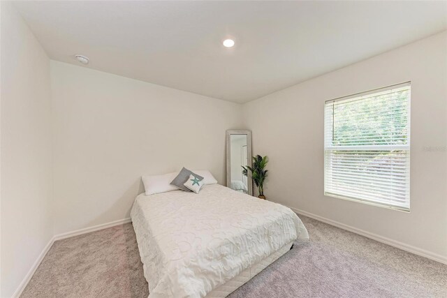 3879 E Price Blvd, North Port, FL 34288 - bedroom featuring baseboards and carpet floors