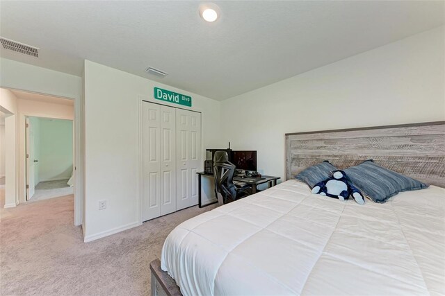 3879 E Price Blvd, North Port, FL 34288 - carpeted bedroom featuring visible vents, baseboards, and a closet