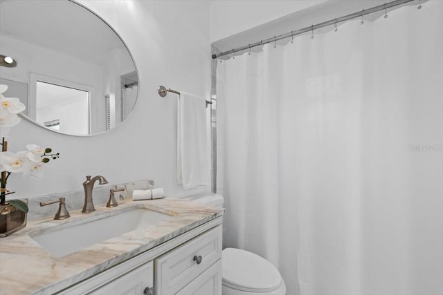 15118 Brushwood Dr, Tampa, FL 33624 - bathroom with vanity, toilet, and a shower with curtain