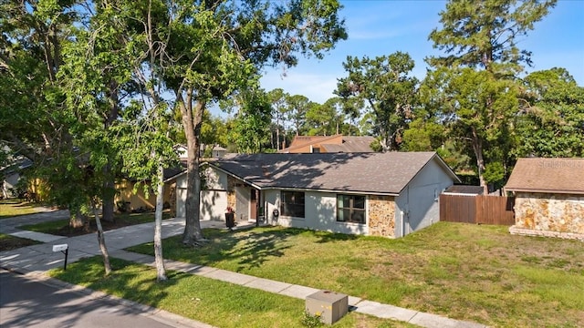 15118 Brushwood Dr, Tampa, FL 33624 - mid-century modern home with driveway and an attached garage