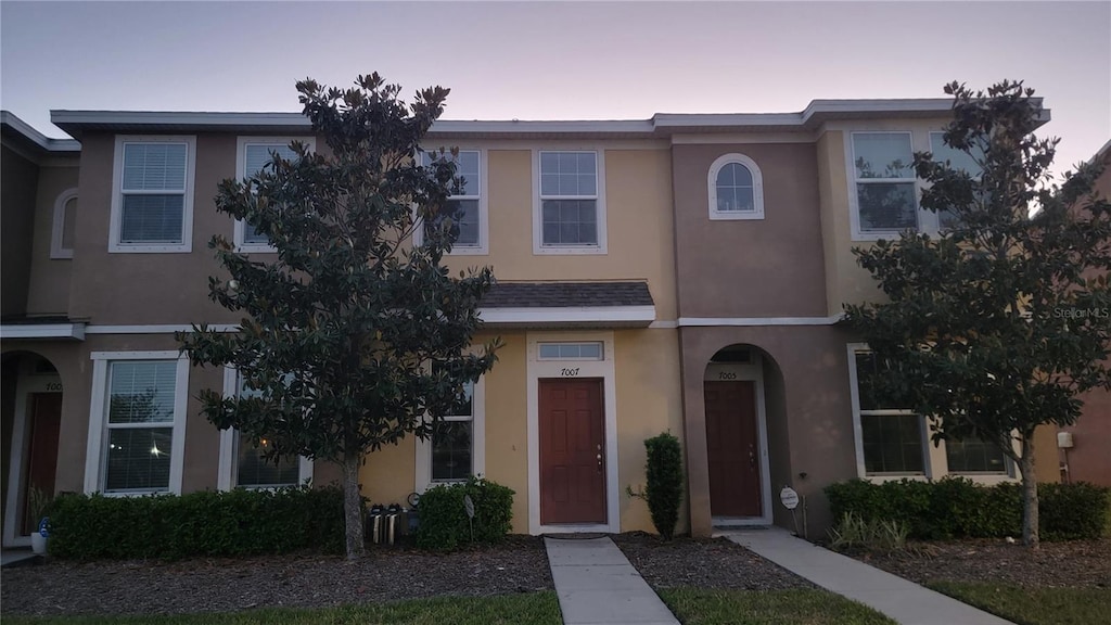 multi unit property featuring stucco siding