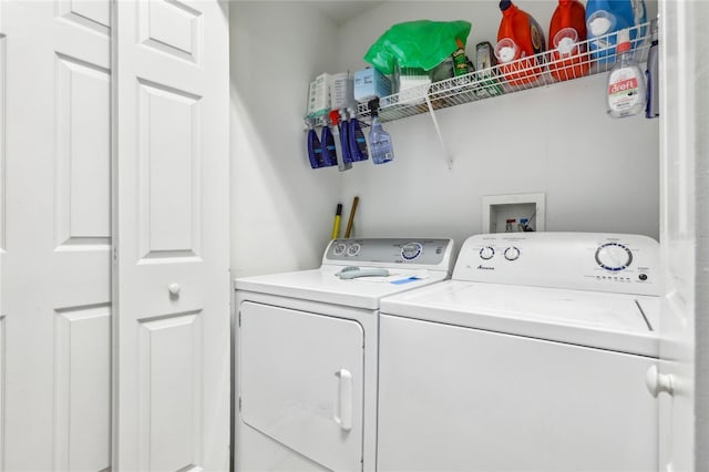 washroom with washer and clothes dryer