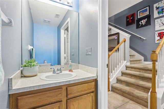 bathroom featuring tile patterned floors and vanity