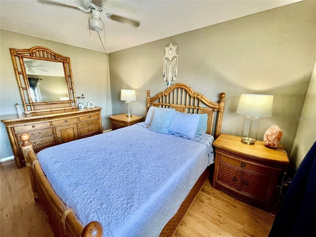825 S Village Dr N Unit 201, Saint Petersburg, FL 33716 - bedroom featuring wood finished floors and a ceiling fan