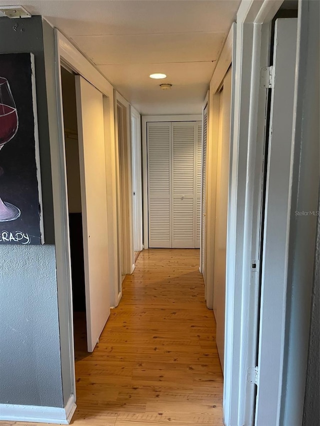 825 S Village Dr N Unit 201, Saint Petersburg, FL 33716 - corridor featuring light wood finished floors and recessed lighting