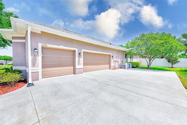 2250 Mountain Ash Way, New Port Richey, FL 34655 - garage featuring driveway