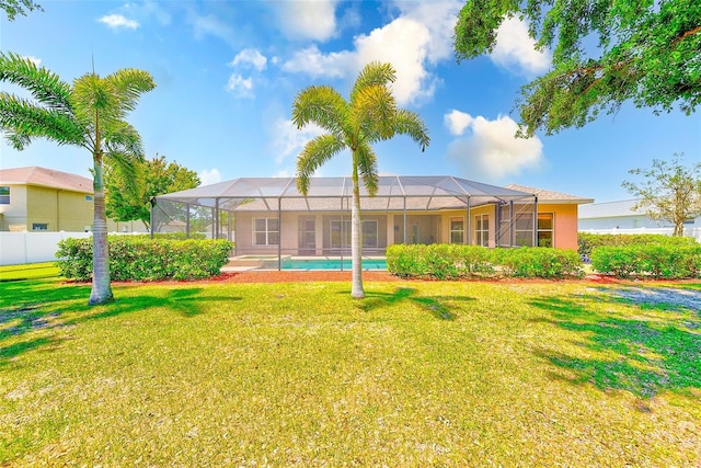2250 Mountain Ash Way, New Port Richey, FL 34655 - back of property featuring a yard and a lanai