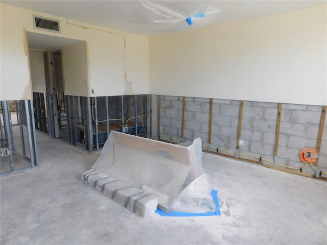 4715 Bay St NE Unit 119, Saint Petersburg, FL 33703 - miscellaneous room with concrete flooring and visible vents
