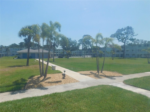 4715 Bay St NE Unit 119, Saint Petersburg, FL 33703 - surrounding community with a yard