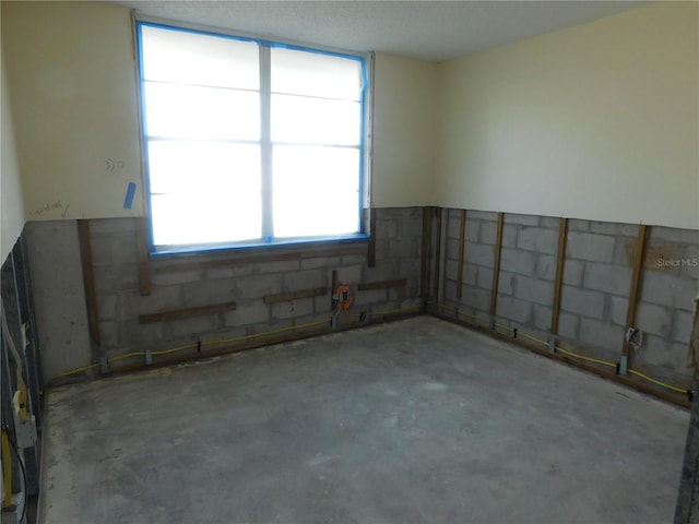 4715 Bay St NE Unit 119, Saint Petersburg, FL 33703 - spare room featuring concrete flooring