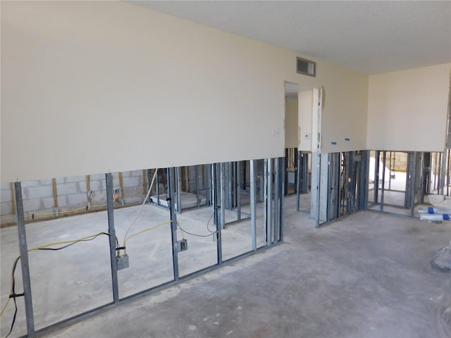 4715 Bay St NE Unit 119, Saint Petersburg, FL 33703 - spare room featuring visible vents and unfinished concrete floors