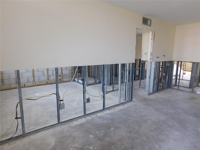 4715 Bay St NE Unit 119, Saint Petersburg, FL 33703 - empty room featuring concrete flooring and visible vents