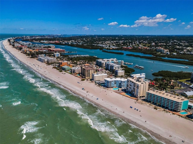 bird's eye view featuring a beach view and a water view