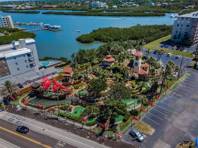 birds eye view of property with a water view