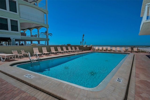 community pool featuring a patio