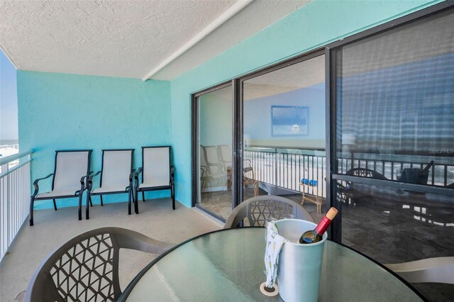 balcony featuring outdoor dining space