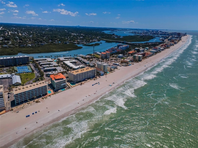 bird's eye view featuring a view of the beach and a water view