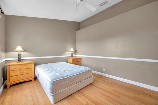 13777 Forest Lake Dr, Largo, FL 33771 - bedroom featuring baseboards, light wood-style flooring, and visible vents