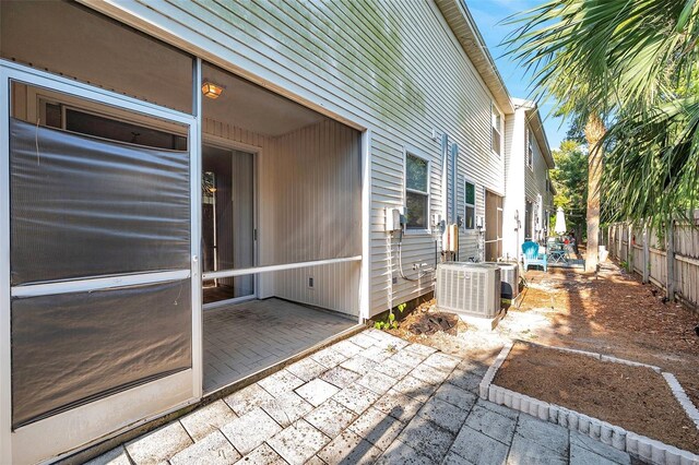 13777 Forest Lake Dr, Largo, FL 33771 - view of patio / terrace featuring fence and cooling unit