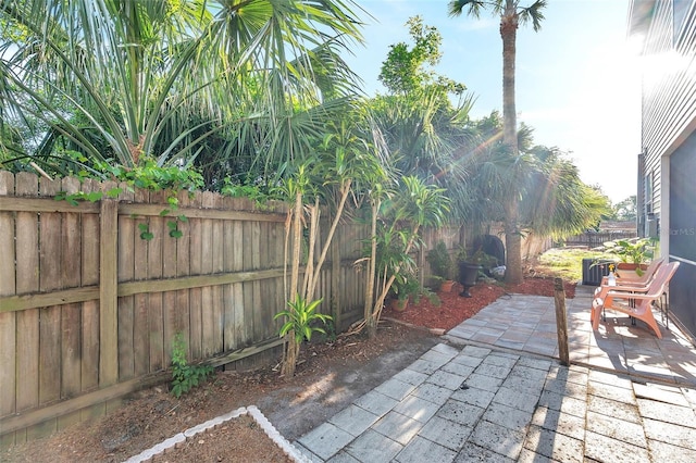 13777 Forest Lake Dr, Largo, FL 33771 - view of patio with a fenced backyard