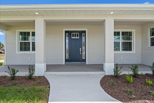 10493 Grail Ave, Englewood, FL 34224 - view of exterior entry with covered porch