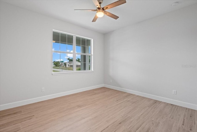10493 Grail Ave, Englewood, FL 34224 - unfurnished room featuring baseboards, light wood-type flooring, and ceiling fan
