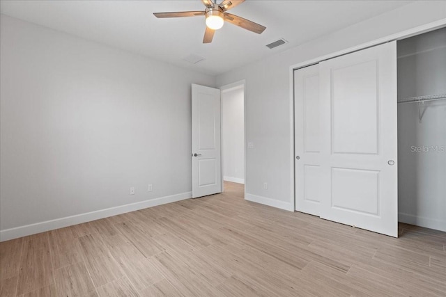 10493 Grail Ave, Englewood, FL 34224 - unfurnished bedroom featuring a closet, visible vents, baseboards, and light wood-style flooring