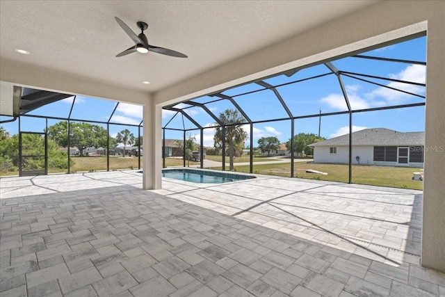 10493 Grail Ave, Englewood, FL 34224 - outdoor pool featuring a patio, a yard, a lanai, and a ceiling fan