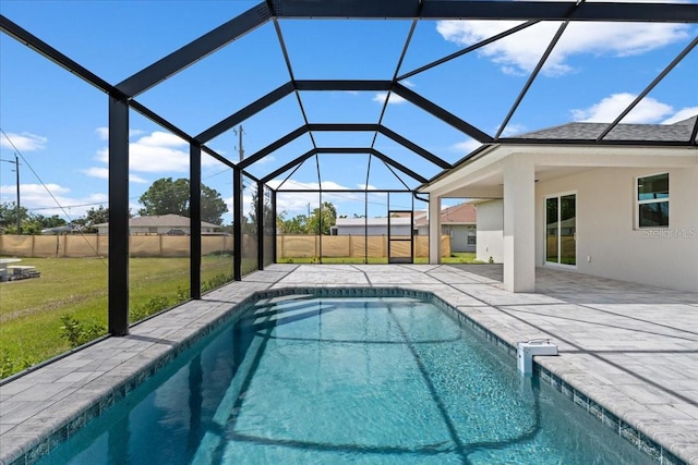 10493 Grail Ave, Englewood, FL 34224 - view of swimming pool featuring a yard, fence, a patio, a fenced in pool, and a lanai