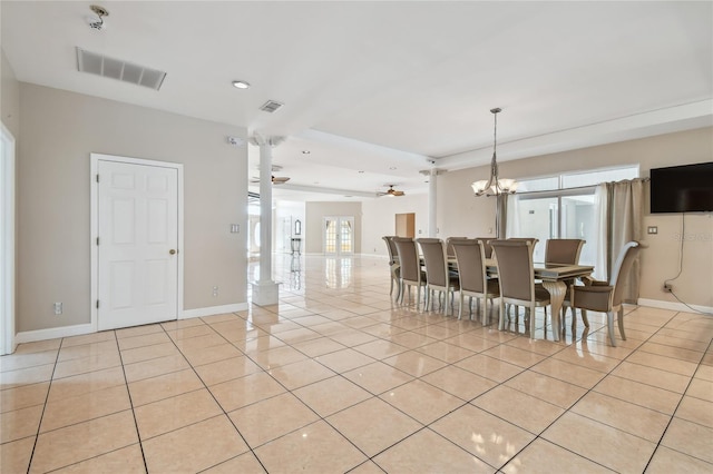 284 Peninsula Ave, Tarpon Springs, FL 34689 - dining space with light tile patterned flooring, a chandelier, baseboards, ceiling fan, and recessed lighting