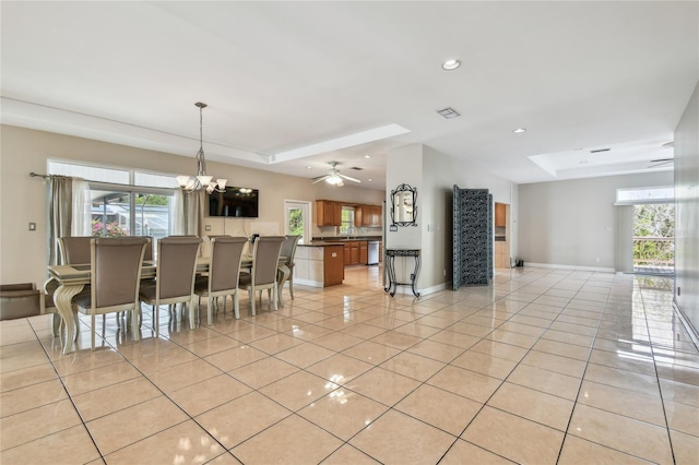 284 Peninsula Ave, Tarpon Springs, FL 34689 - dining room with light tile patterned floors, a chandelier, plenty of natural light, baseboards, and recessed lighting