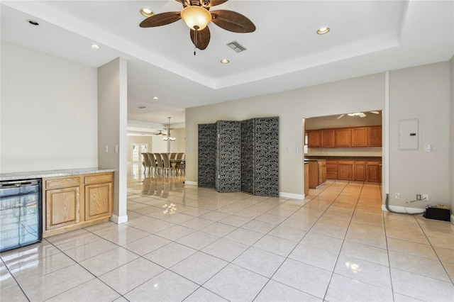 284 Peninsula Ave, Tarpon Springs, FL 34689 - unfurnished living room with ceiling fan, light tile patterned flooring, recessed lighting, wine cooler, and electric panel