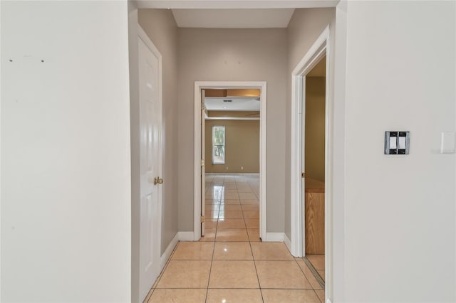 284 Peninsula Ave, Tarpon Springs, FL 34689 - hall with light tile patterned flooring and baseboards