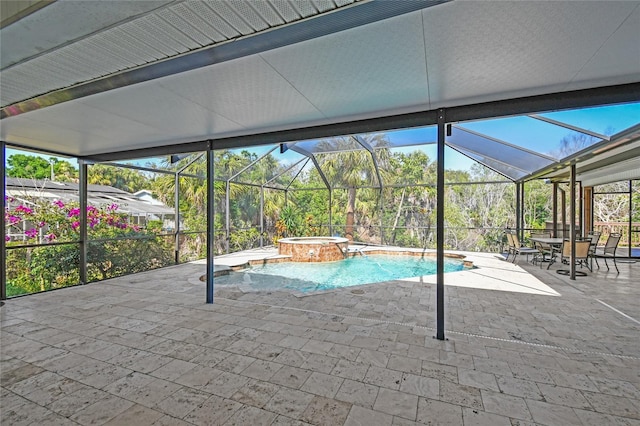 284 Peninsula Ave, Tarpon Springs, FL 34689 - view of pool featuring a patio area, a pool with connected hot tub, a lanai, and outdoor dining space