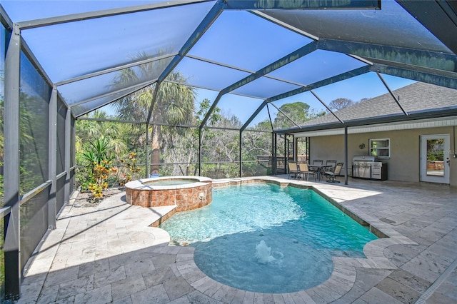 284 Peninsula Ave, Tarpon Springs, FL 34689 - view of swimming pool featuring a patio area, a pool with connected hot tub, glass enclosure, and outdoor dining area