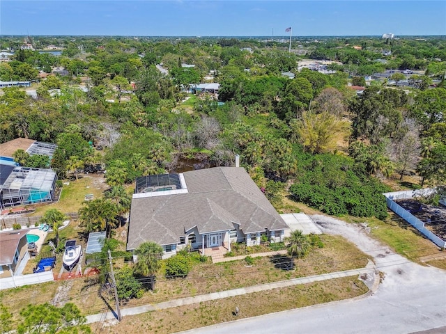 284 Peninsula Ave, Tarpon Springs, FL 34689 - view of subject property with a tree filled landscape