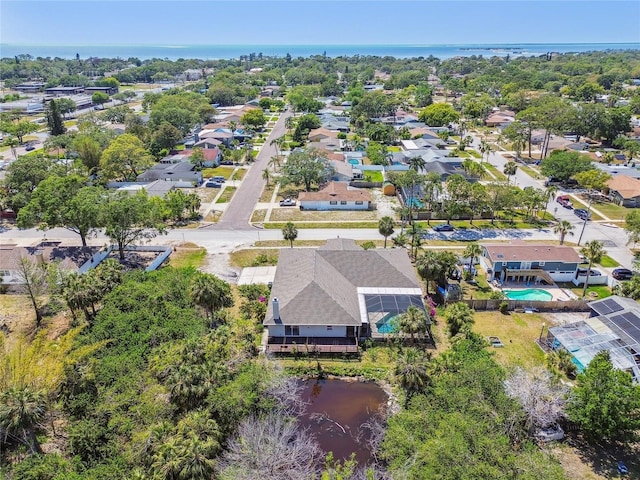 284 Peninsula Ave, Tarpon Springs, FL 34689 - aerial view of residential area featuring a nearby body of water and a pool area