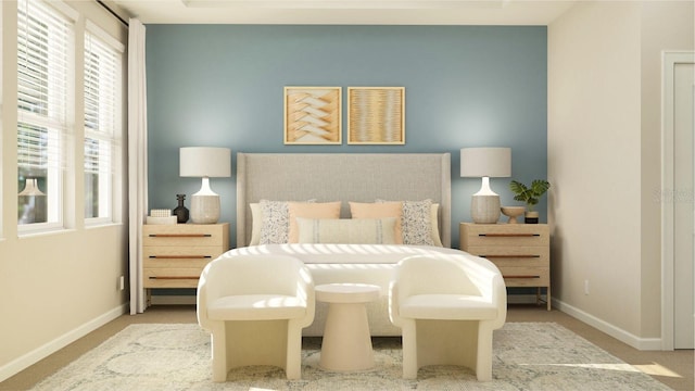 carpeted bedroom with baseboards