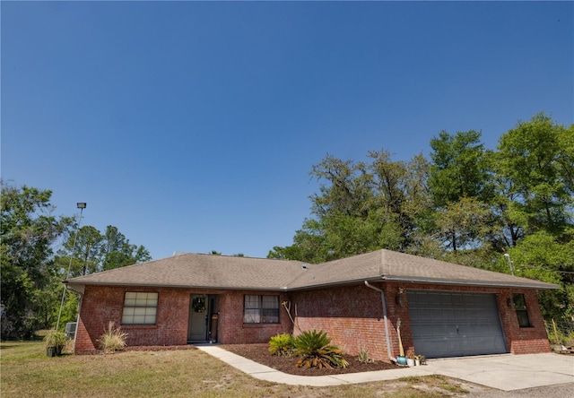 35109 Excalibur, Webster, FL 33597 - ranch-style house featuring a garage, driveway, a front lawn, and brick siding
