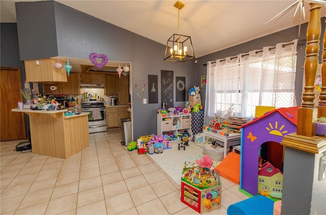 35109 Excalibur, Webster, FL 33597 - game room featuring a chandelier, high vaulted ceiling, and light tile patterned flooring