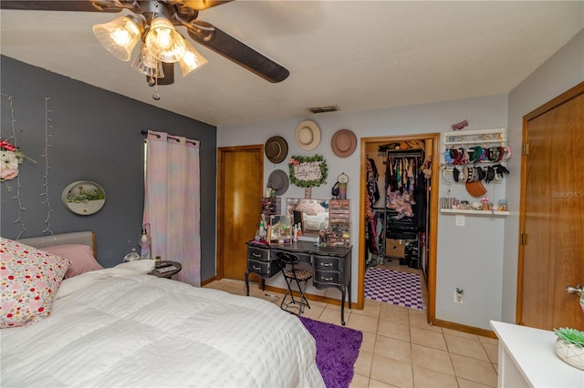 35109 Excalibur, Webster, FL 33597 - bedroom with light tile patterned floors, visible vents, baseboards, and ceiling fan