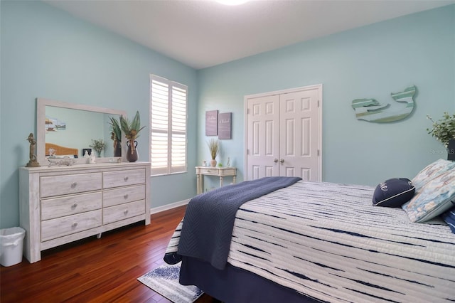 1023 Orca Ct, Holiday, FL 34691 - bedroom with dark wood-style flooring and a closet