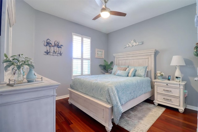 1023 Orca Ct, Holiday, FL 34691 - bedroom with baseboards, dark wood-type flooring, and ceiling fan