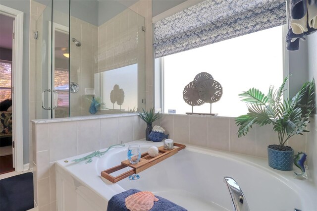 1023 Orca Ct, Holiday, FL 34691 - bathroom with a shower stall and a garden tub