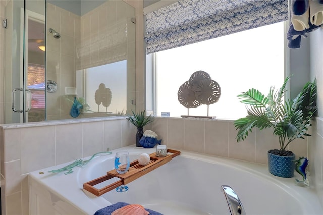 1023 Orca Ct, Holiday, FL 34691 - bathroom with a shower stall and a garden tub